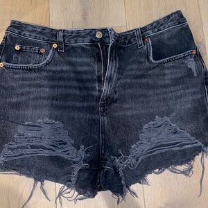 Topshop black ripped denim shorts.